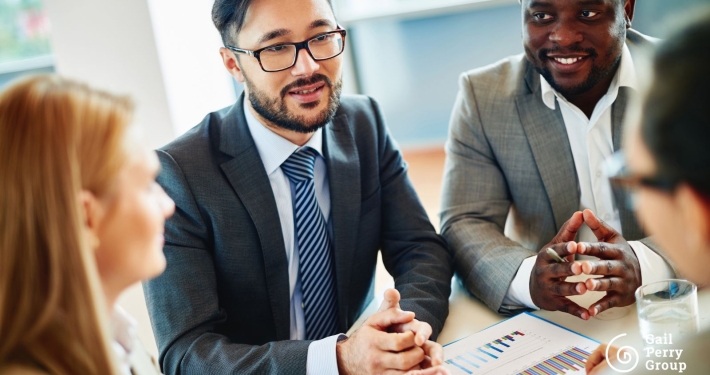 Nonprofit leaders meeting with a fundraising consultant to discuss strategy