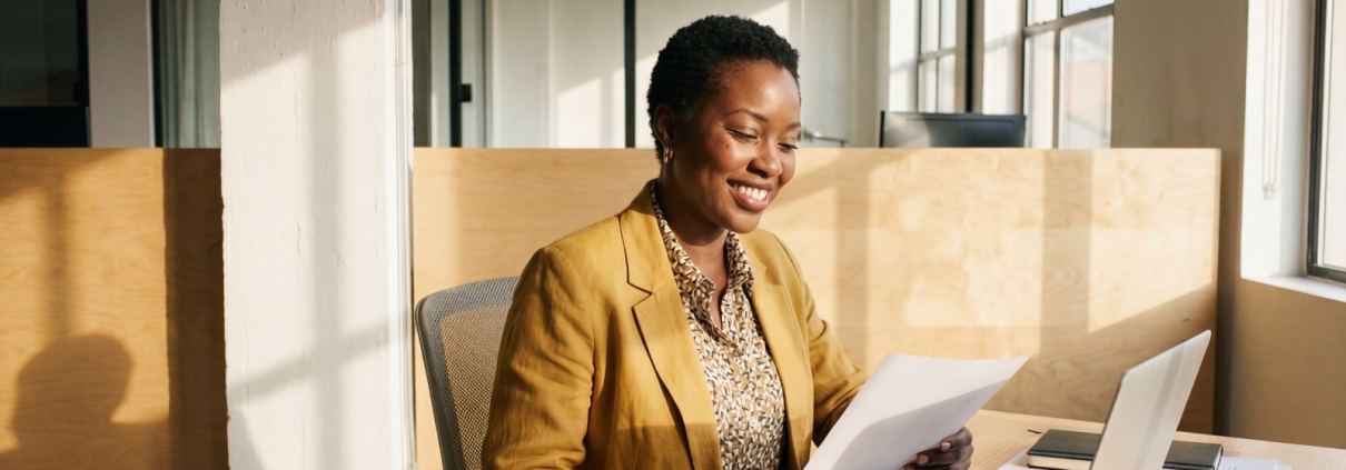 Fundraiser preparing for a major donor cultivation visit, reviewing notes