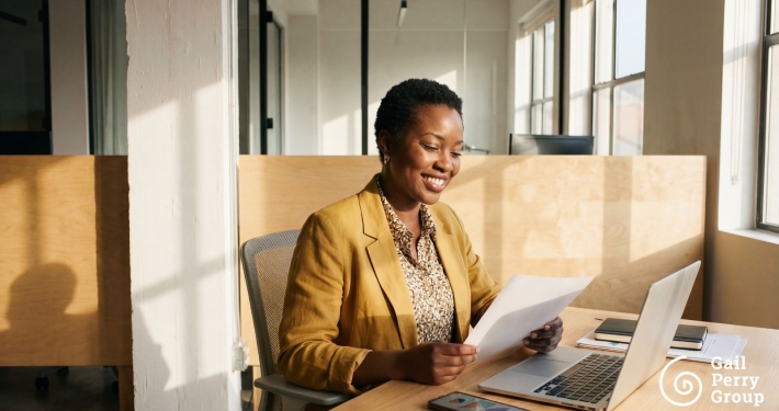 Fundraiser preparing for a major donor cultivation visit, reviewing notes