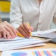 Fundraising consultant reviewing feasibility study interview data with nonprofit leaders