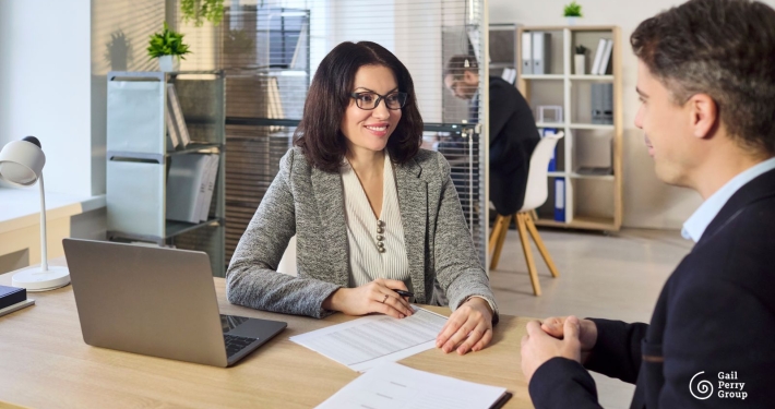 Fundraising consultant reviewing feasibility study interview data with nonprofit leaders