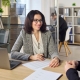 Fundraising consultant reviewing feasibility study interview data with nonprofit leaders