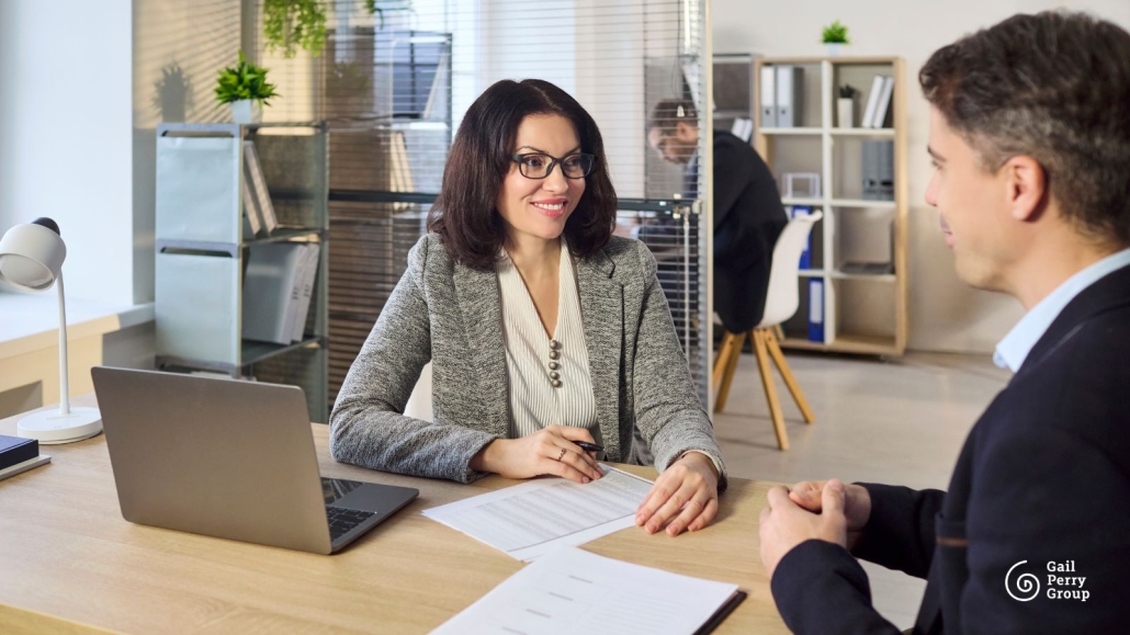 Fundraising consultant reviewing feasibility study interview data with nonprofit leaders