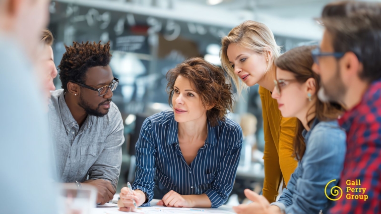 High-performing fundraising team collaborating during a strategy meeting