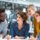 High-performing fundraising team collaborating during a strategy meeting